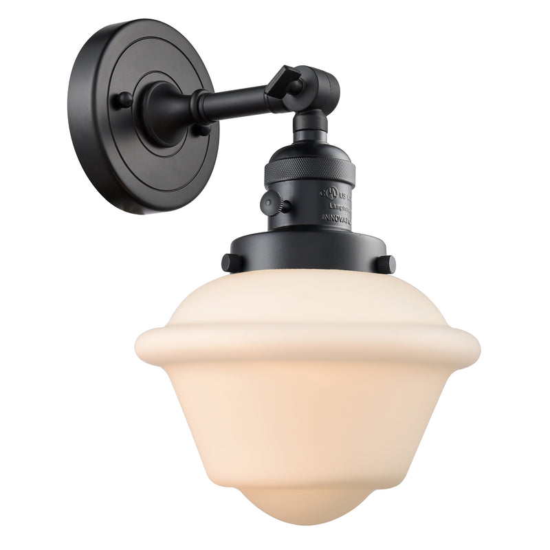 Oxford Sconce shown in the Matte Black finish with a Matte White shade