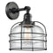 Bell Cage Sconce shown in the Matte Black finish with a Clear shade