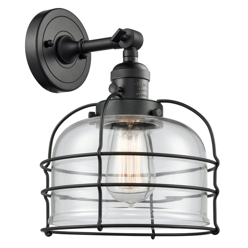 Bell Cage Sconce shown in the Matte Black finish with a Clear shade