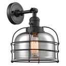 Bell Cage Sconce shown in the Matte Black finish with a Plated Smoke shade