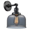 Bell Sconce shown in the Matte Black finish with a Plated Smoke shade