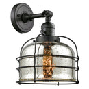 Bell Cage Sconce shown in the Matte Black finish with a Silver Plated Mercury shade