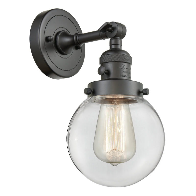 Beacon Sconce shown in the Oil Rubbed Bronze finish with a Clear shade