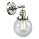 Beacon Sconce shown in the Polished Nickel finish with a Seedy shade