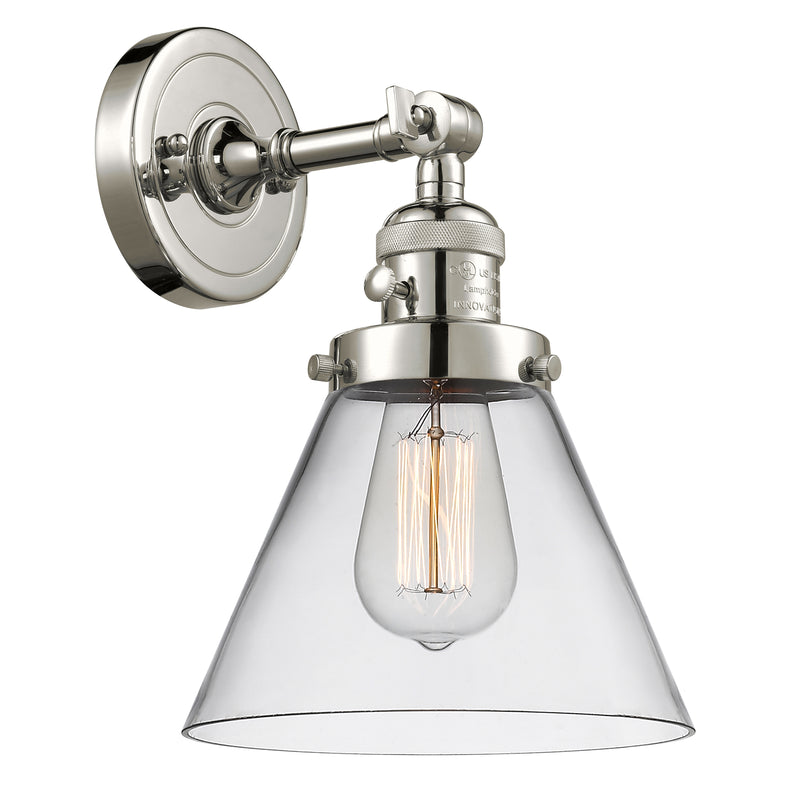 Cone Sconce shown in the Polished Nickel finish with a Clear shade