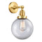 Beacon Sconce shown in the Satin Gold finish with a Clear shade