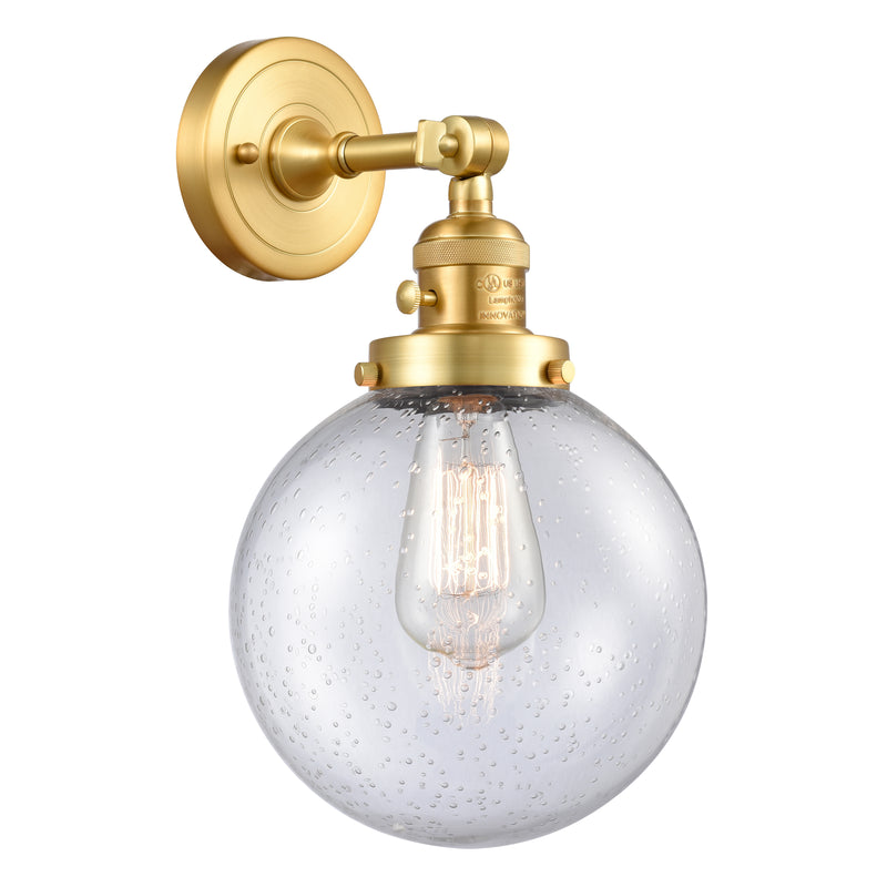 Beacon Sconce shown in the Satin Gold finish with a Seedy shade