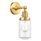 Dover Sconce shown in the Satin Gold finish with a Clear shade