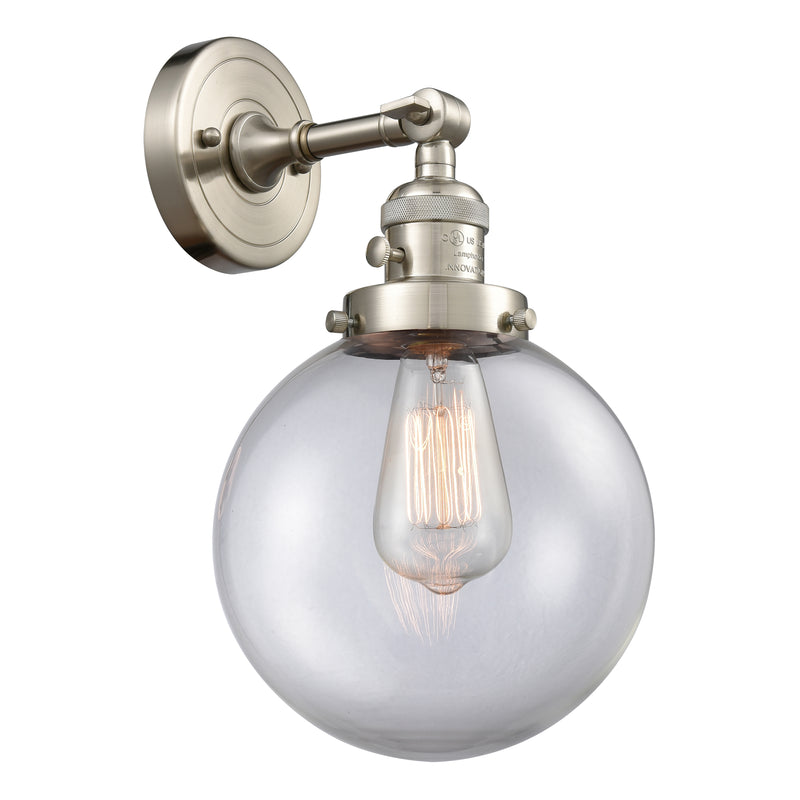 Beacon Sconce shown in the Brushed Satin Nickel finish with a Clear shade