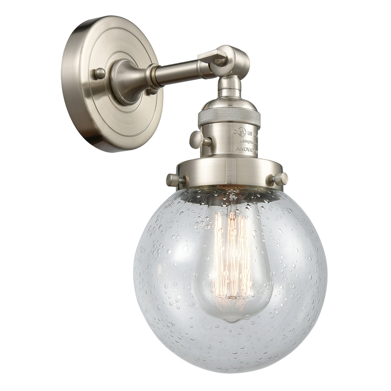 Beacon Sconce shown in the Brushed Satin Nickel finish with a Seedy shade