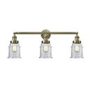Canton Bath Vanity Light shown in the Antique Brass finish with a Clear shade