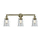 Canton Bath Vanity Light shown in the Antique Brass finish with a Clear shade