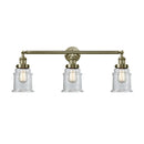 Canton Bath Vanity Light shown in the Antique Brass finish with a Clear shade