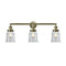 Canton Bath Vanity Light shown in the Antique Brass finish with a Clear shade