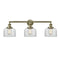 Bell Bath Vanity Light shown in the Antique Brass finish with a Clear shade