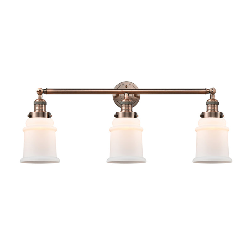 Canton Bath Vanity Light shown in the Antique Copper finish with a Matte White shade