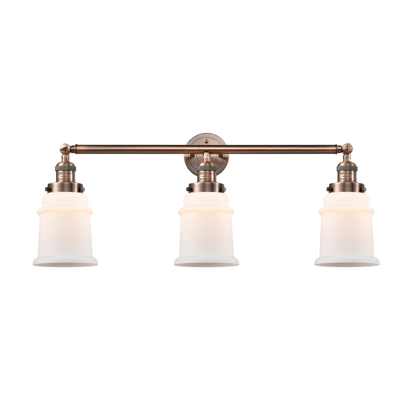 Canton Bath Vanity Light shown in the Antique Copper finish with a Matte White shade