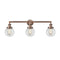 Beacon Bath Vanity Light shown in the Antique Copper finish with a Clear shade
