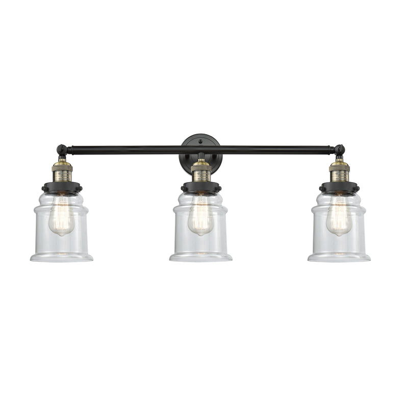 Canton Bath Vanity Light shown in the Black Antique Brass finish with a Clear shade