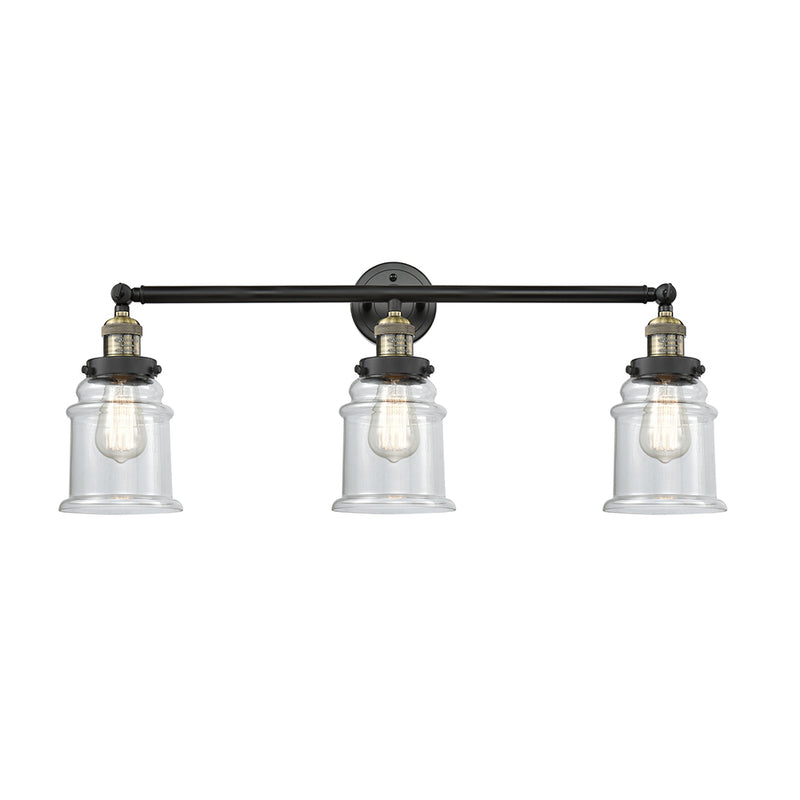 Canton Bath Vanity Light shown in the Black Antique Brass finish with a Clear shade