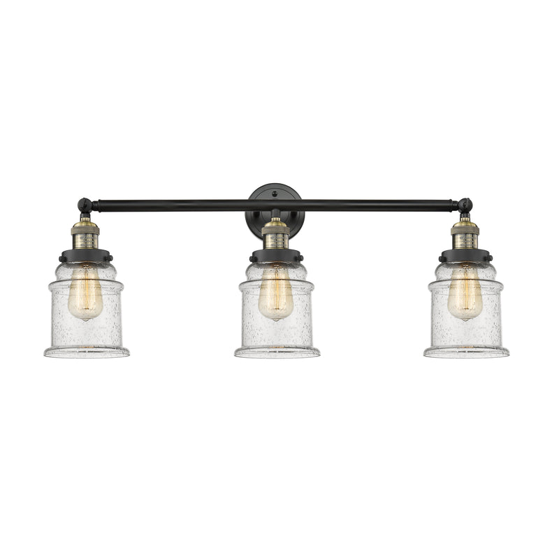 Canton Bath Vanity Light shown in the Black Antique Brass finish with a Seedy shade