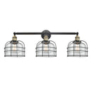 Bell Cage Bath Vanity Light shown in the Black Antique Brass finish with a Clear shade