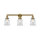 Canton Bath Vanity Light shown in the Brushed Brass finish with a Clear shade