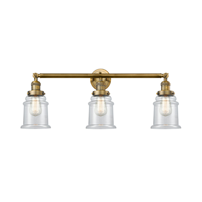 Canton Bath Vanity Light shown in the Brushed Brass finish with a Clear shade