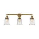 Canton Bath Vanity Light shown in the Brushed Brass finish with a Seedy shade