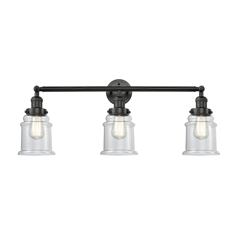 Canton Bath Vanity Light shown in the Matte Black finish with a Clear shade