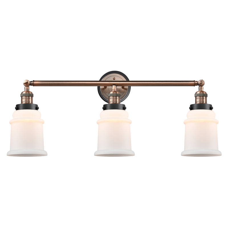 Canton Bath Vanity Light shown in the Antique Copper finish with a Matte White shade
