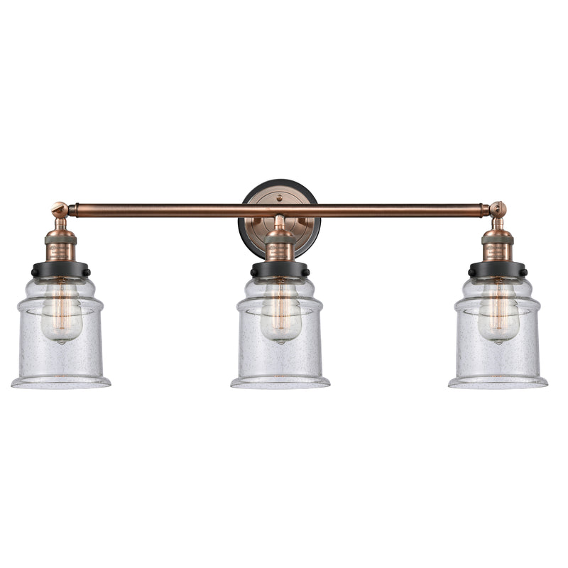 Canton Bath Vanity Light shown in the Antique Copper finish with a Seedy shade
