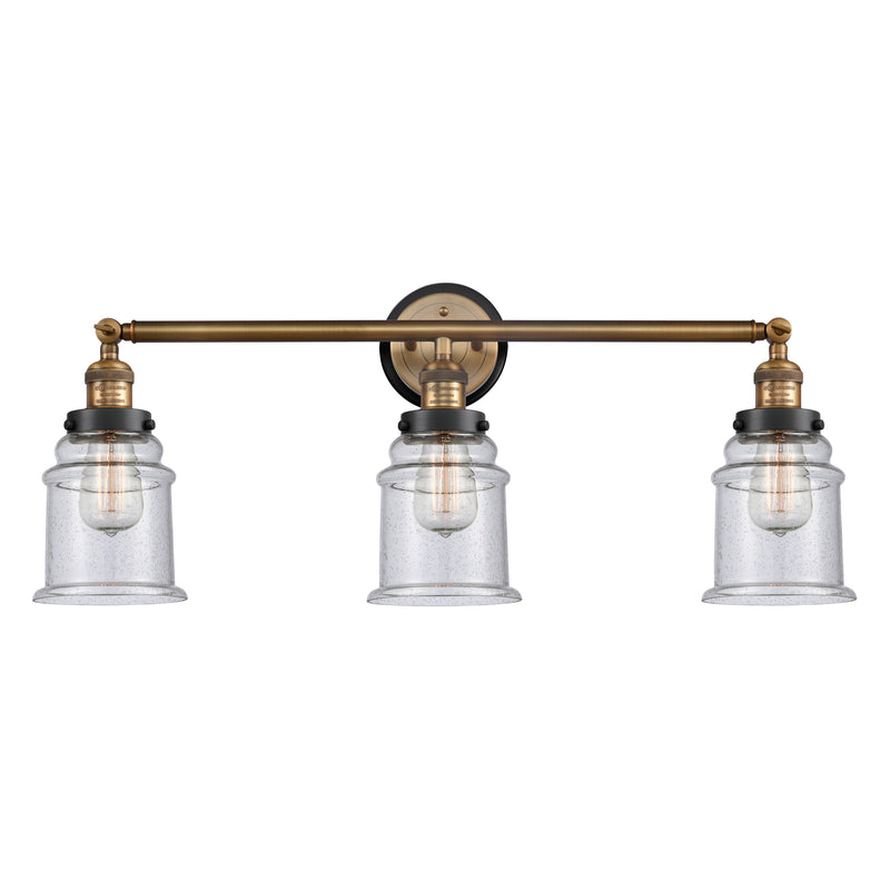 Canton Bath Vanity Light shown in the Brushed Brass finish with a Seedy shade