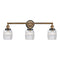 Colton Bath Vanity Light shown in the Brushed Brass finish with a Clear Halophane shade