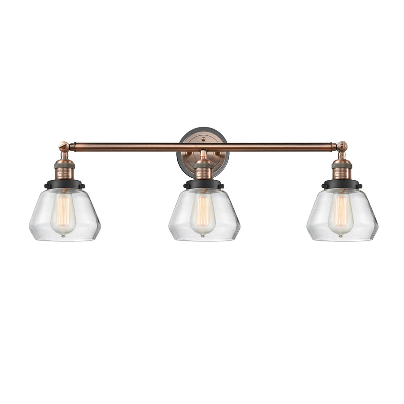 Fulton Bath Vanity Light shown in the Antique Copper finish with a Clear shade