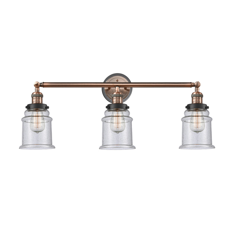 Canton Bath Vanity Light shown in the Antique Copper finish with a Seedy shade