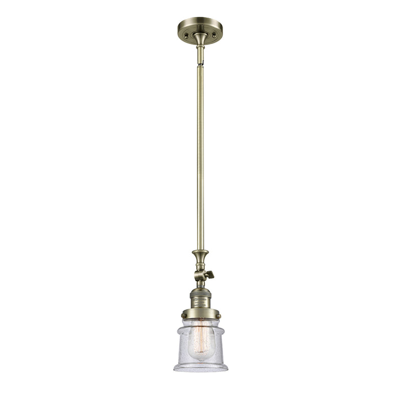 Canton Mini Pendant shown in the Antique Brass finish with a Seedy shade