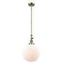 Beacon Mini Pendant shown in the Antique Brass finish with a Matte White shade