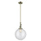 Beacon Mini Pendant shown in the Antique Brass finish with a Clear shade