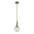 Beacon Mini Pendant shown in the Antique Brass finish with a Clear shade