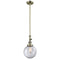 Beacon Mini Pendant shown in the Antique Brass finish with a Clear shade