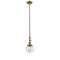 Beacon Mini Pendant shown in the Antique Brass finish with a Seedy shade