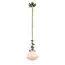 Olean Mini Pendant shown in the Antique Brass finish with a Matte White shade