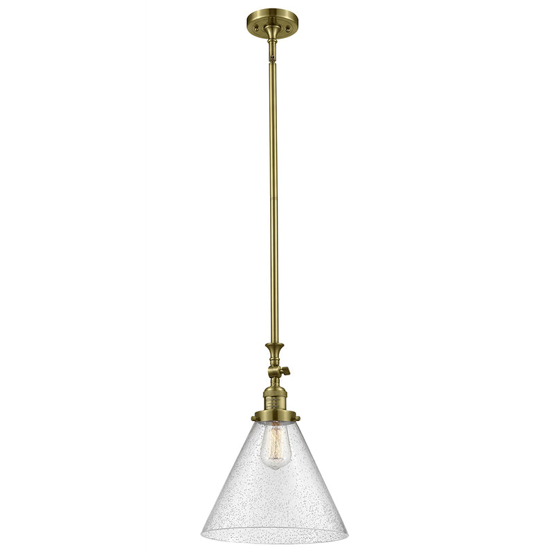 Cone Mini Pendant shown in the Antique Brass finish with a Seedy shade