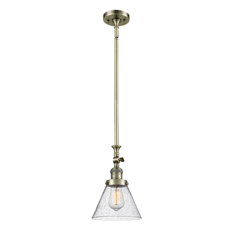 Cone Mini Pendant shown in the Antique Brass finish with a Seedy shade