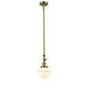 Oxford Mini Pendant shown in the Antique Brass finish with a Matte White shade