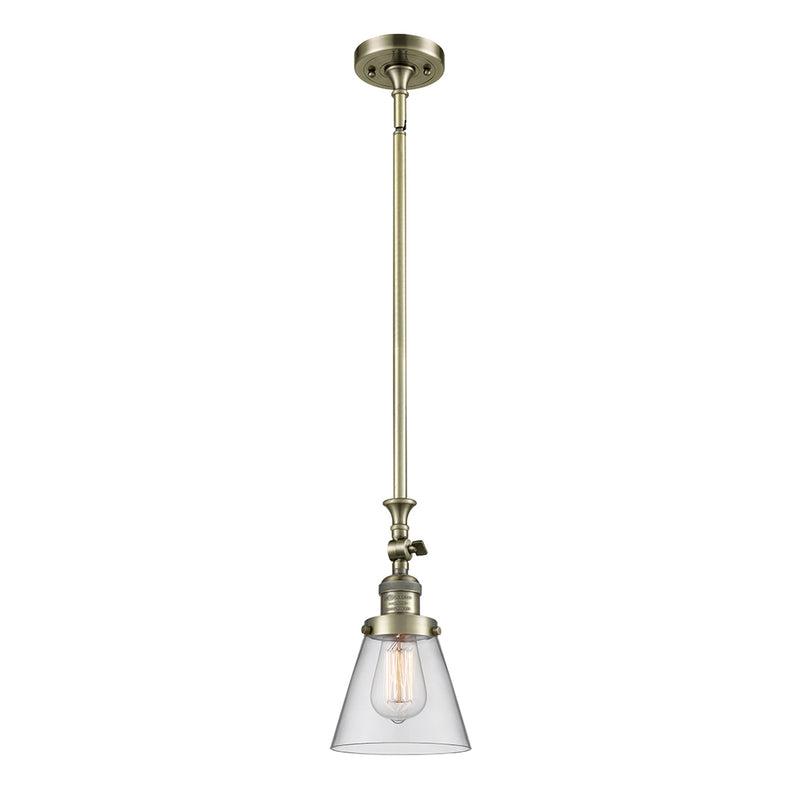 Cone Mini Pendant shown in the Antique Brass finish with a Clear shade