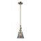 Cone Mini Pendant shown in the Antique Brass finish with a Plated Smoke shade