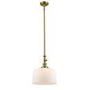 Bell Mini Pendant shown in the Antique Brass finish with a Matte White shade