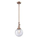 Beacon Mini Pendant shown in the Antique Copper finish with a Seedy shade